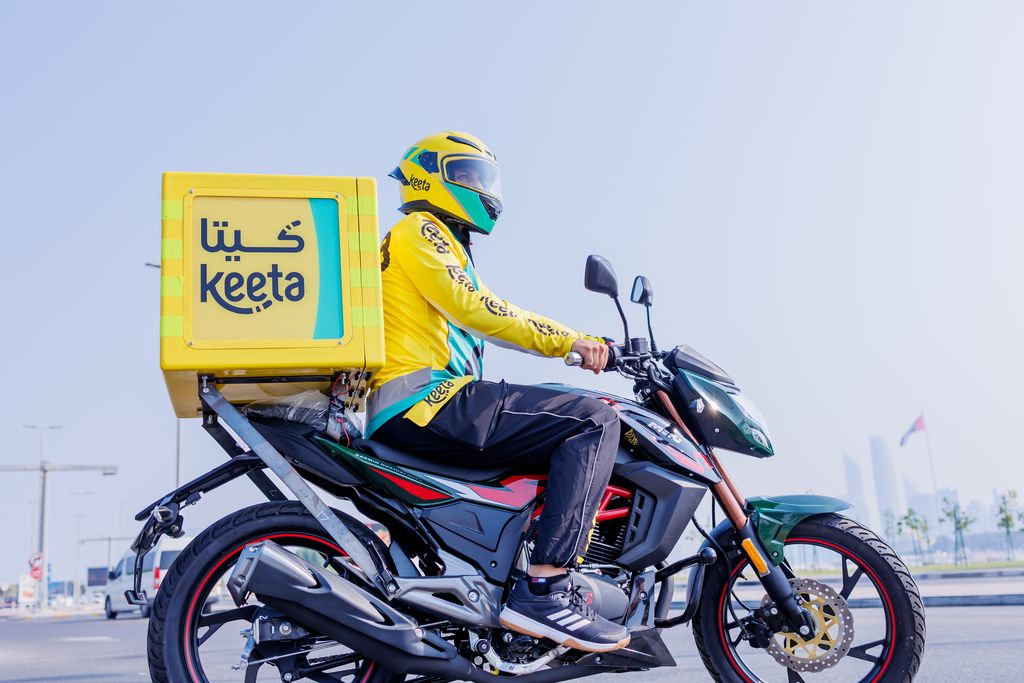 A YaBalash rider delivering for KEETA in Abu Dhabi.